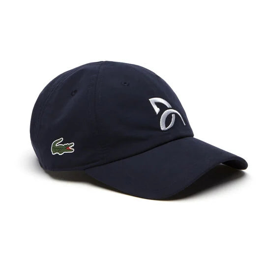 Lacoste Sport x Novak Djokovic Tennis Cap featuring lightweight performance fabric, an adjustable fit, curved brim, and signature tennis styling.