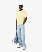 Lacoste Unisex Adjustable Twill Cap featuring durable twill fabric, an adjustable fit, curved brim, and embroidered crocodile logo.