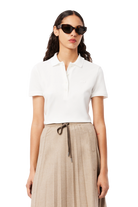 Lacoste Women's L.12.D Slim Fit Stretch Mini Piqué golf polo with breathable stretch fabric and iconic crocodile logo for golf wear