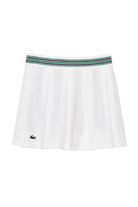 Lacoste Women's Piqué Sport Skirt with Built-In Tennis Shorts featuring breathable piqué fabric, integrated shorts, athletic fit, and crocodile branding.