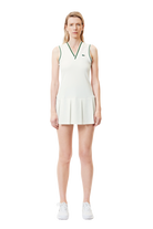 Lacoste Women's Sport Dress with Removable Piqué Shorts featuring lightweight performance fabric, removable shorts, athletic styling, and crocodile branding.