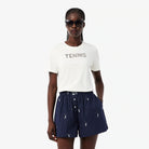 Lacoste Women's Tennis Embroidery T-Shirt featuring soft fabric, embroidered tennis-inspired graphics, breathable comfort, and crocodile branding.