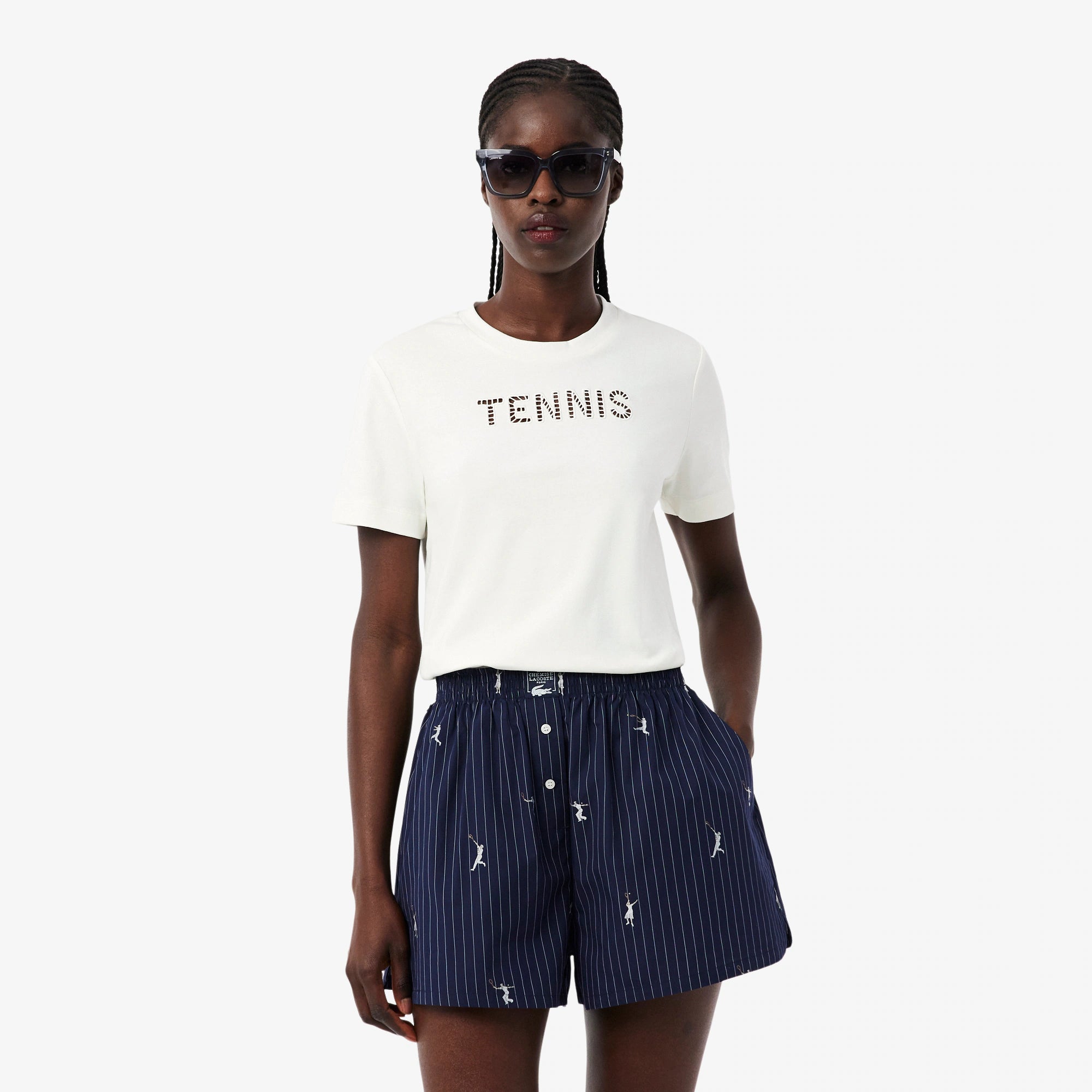 Lacoste Women's Tennis Embroidery T-Shirt featuring soft fabric, embroidered tennis-inspired graphics, breathable comfort, and crocodile branding.