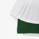 Lacoste Women's Ultra Dry Lined Tennis Skirt featuring stretch performance fabric, integrated liner, moisture management, and crocodile branding.