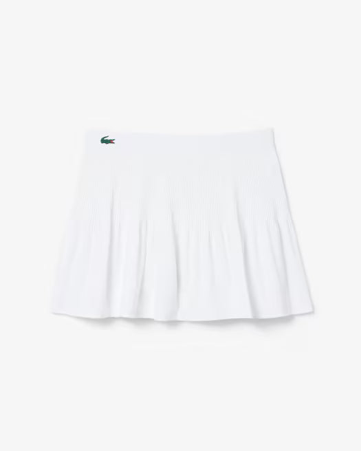 Lacoste Women's Ultra Dry Lined Tennis Skirt featuring moisture-wicking fabric, integrated liner, athletic silhouette, and crocodile branding.