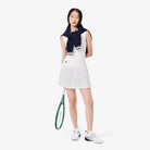 Lacoste Women's Ultra Dry Lined Tennis Skirt featuring stretch performance fabric, integrated liner, moisture management, and crocodile branding.