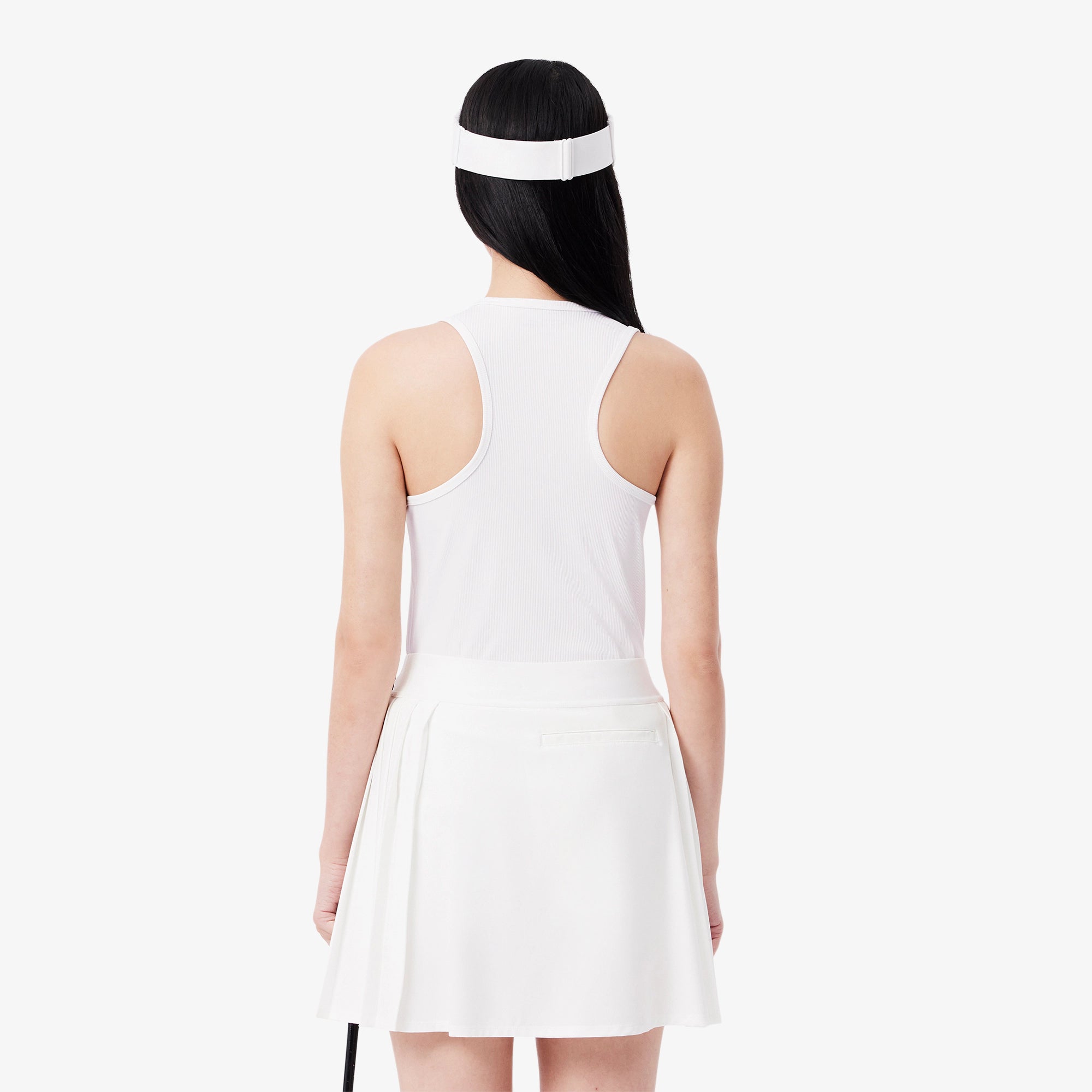 Lacoste Women's Ultra Dry Ribbed Knit golf tank with breathable moisture-wicking fabric and ribbed texture for golf and active wear