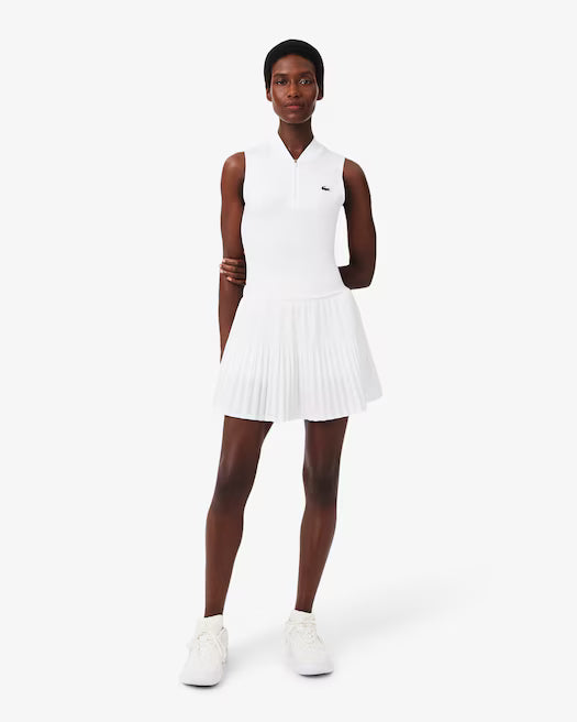Lacoste Women's Ultra Dry Stretch Tennis Dress featuring moisture-wicking stretch fabric, breathable comfort, athletic fit, and crocodile branding.