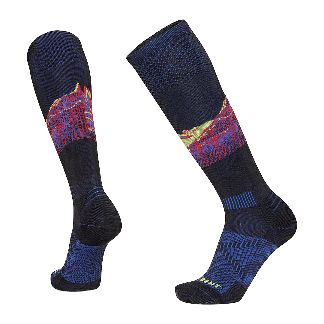 A pair of black and multicolour Le Bent Cody Townsend Pro Series Zero Cushion Ski Socks that are made from a bamboo and merino wool blend.