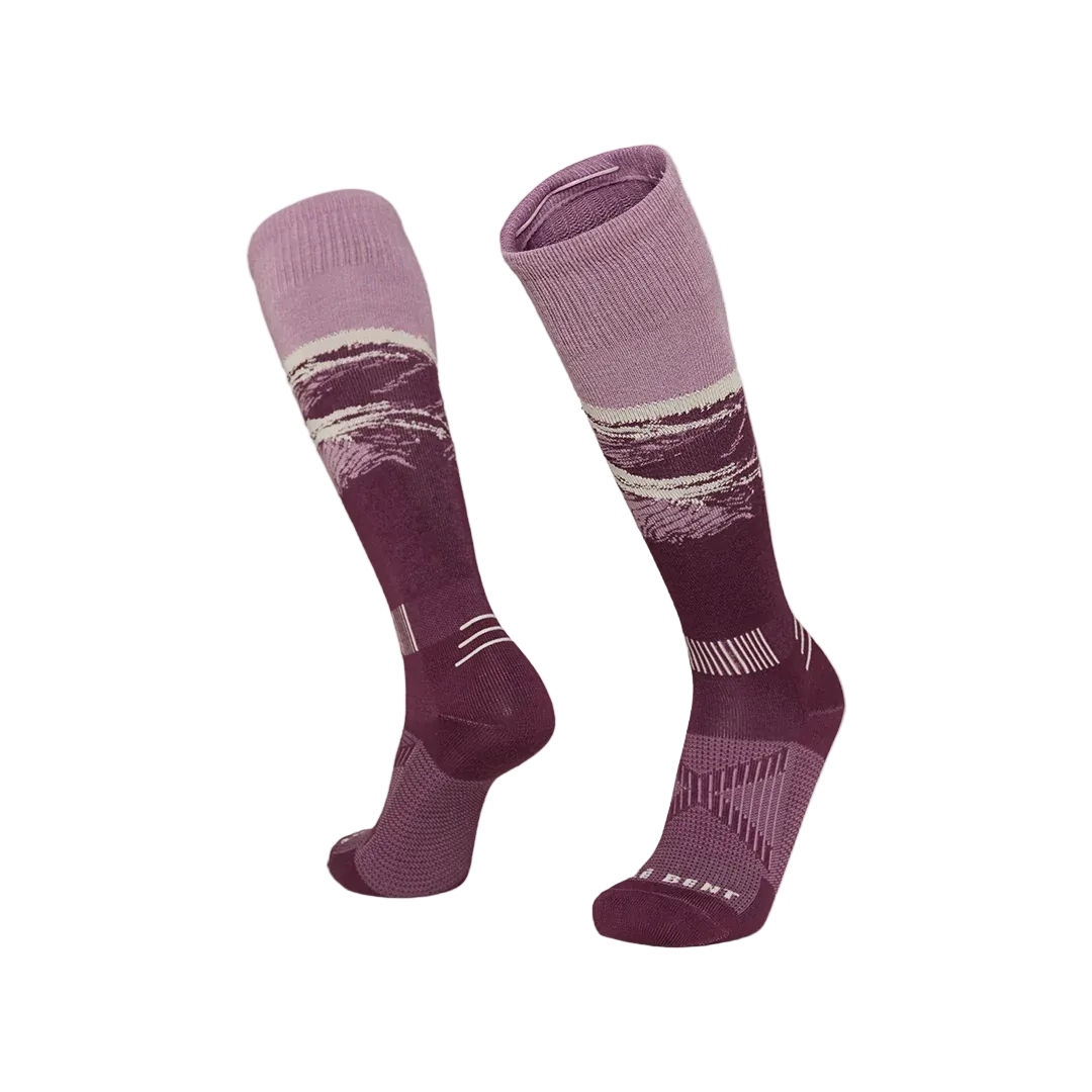A pair of violet ash Le Bent Elyse Saugstad Pro Zero Cushion Ski Socks that are designed specifically for women to stay warm in harsh winter conditions.