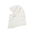 Side view of the Le Bent Heavyweight Grid Fleece Balaclava featuring a Merino wool and bamboo rayon blend, high-loft grid interior, drop-chin hinge, and flatlock seams.