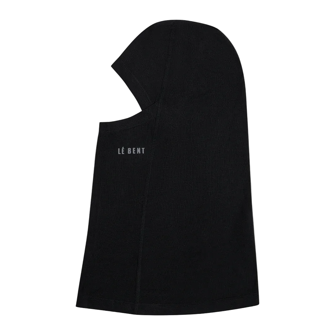 Front view of the Le Bent Lightweight Balaclava featuring a Merino wool and bamboo rayon blend, drop-chin hinge, mesh mouth ventilation port, and low-profile flatlock seams.