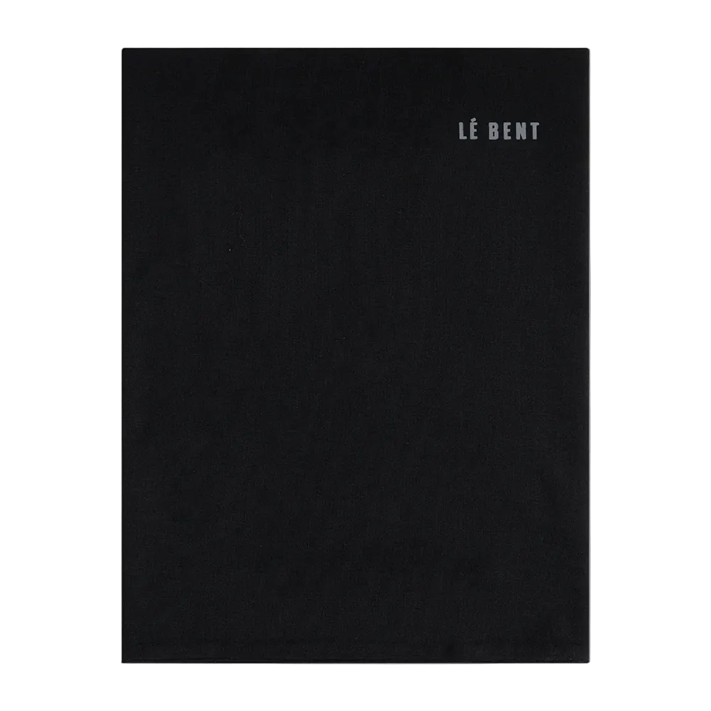 A solid black Le Bent Midweight neck gaiter made from a blend of merino wool and rayon from bamboo.