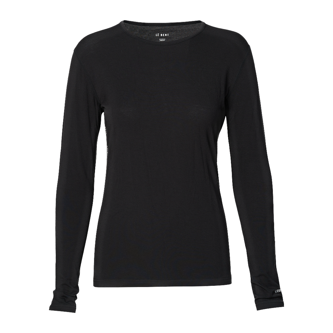 A black Le Bent Women's Core Lightweight Crewneck Baselayer Top that is made from a merino wool and bamboo blend.