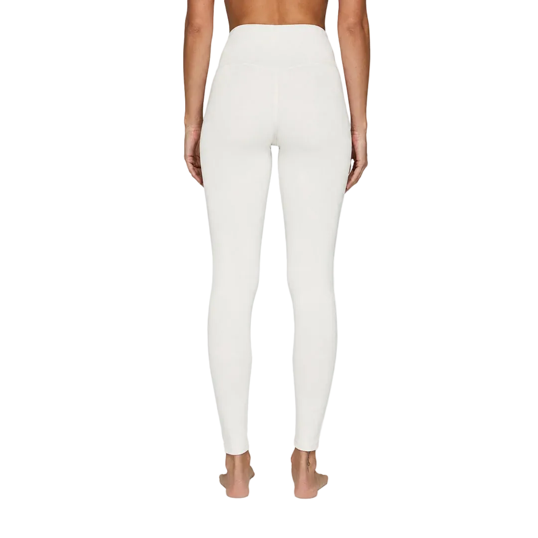 A pair of white Le Bent Women's Core Midweight Baselayer Bottoms that are made from a bamboo and merino wool blend.