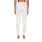 A pair of white Le Bent Women's Core Midweight Baselayer Bottoms that are made from a bamboo and merino wool blend.