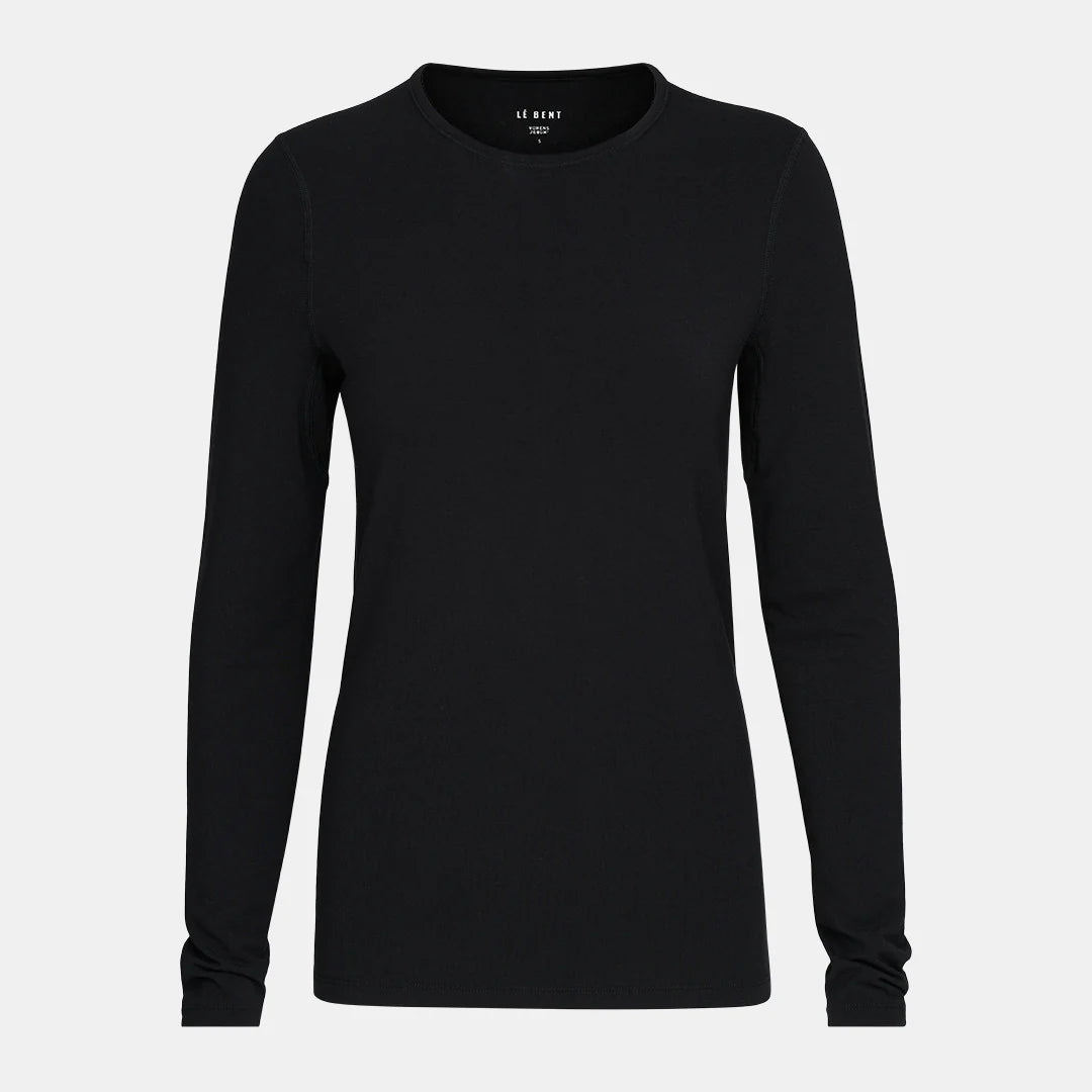 A black Le Bent Women's Core Midweight Crewneck Baselayer Top that is made from a bamboo and merino wool blend.