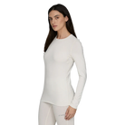 A white Le Bent Women's Core Midweight Crewneck Baselayer Top that is made from a bamboo and merino wool blend.