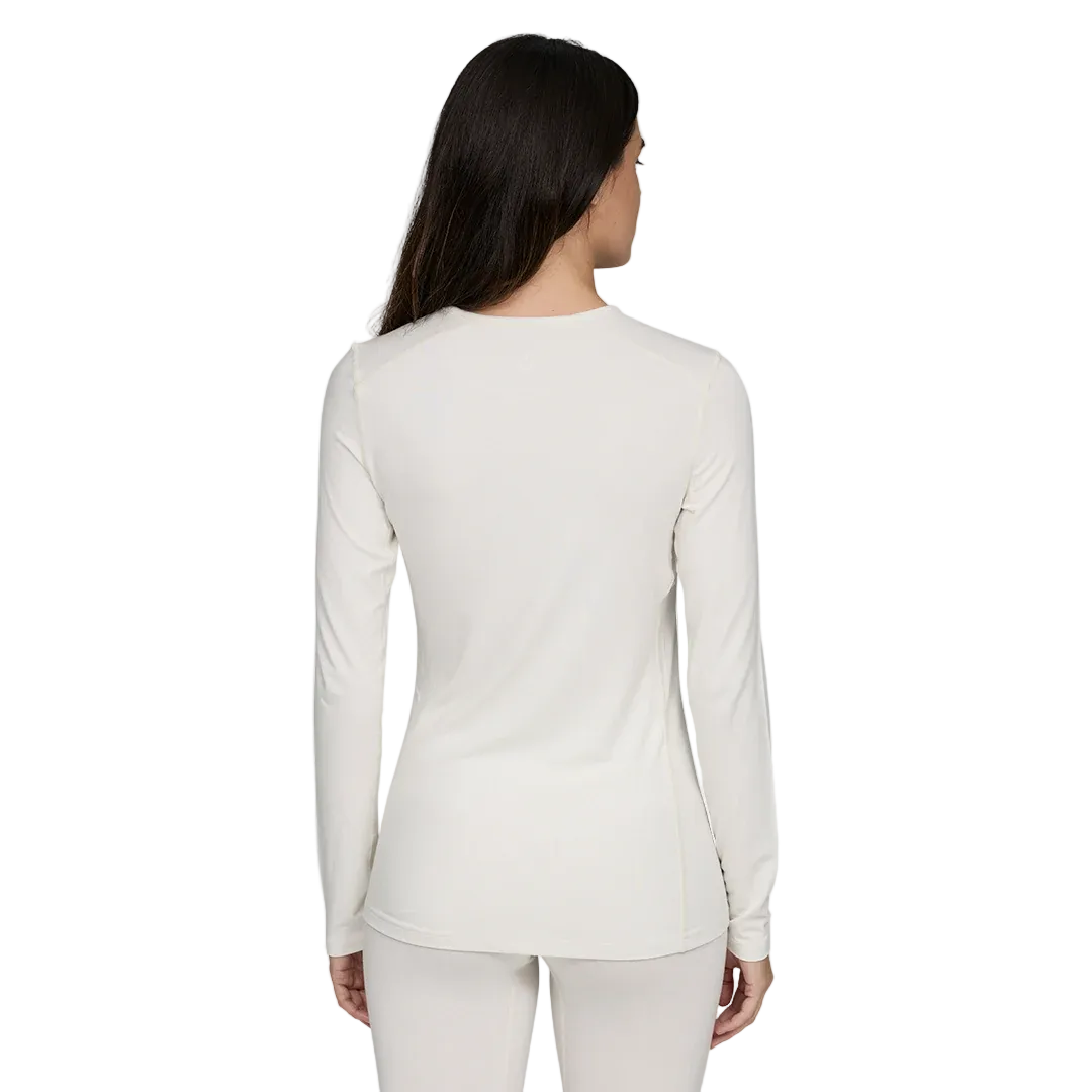 A white Le Bent Women's Core Midweight Crewneck Baselayer Top that is made from a bamboo and merino wool blend.