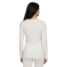 A white Le Bent Women's Core Midweight Crewneck Baselayer Top that is made from a bamboo and merino wool blend.