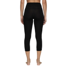 A pair of black Le Bent Women's Core Midweight 3/4 Length Baselayer Bottoms that are made from a bamboo and merino wool blend.