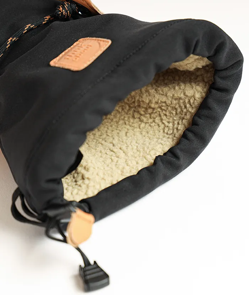 A Lenz Men’s Heated Mitten 9.0 featuring goat leather construction, integrated finger heating elements, inner wrist battery pockets, and single-pull drawcord cuffs.