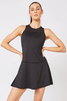 Lija Breeze Women's Tennis Dress featuring lightweight stretch performance fabric, moisture-wicking comfort, breathable construction, and elegant athletic styling.
