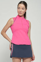 Lija Elite Fluid Women's Tennis Top featuring lightweight performance fabric, moisture-wicking comfort, breathable construction, and athletic styling.