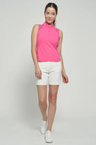 Lija Elite Fluid Women's Tennis Top featuring lightweight performance fabric, moisture-wicking comfort, breathable construction, and athletic styling.