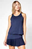 Lija Elite Force Women's Tennis Tank featuring lightweight performance fabric, moisture-wicking comfort, breathable construction, and athletic styling.