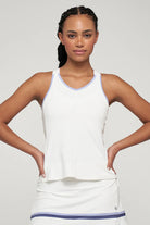 Lija Elite Ladder Women's Tennis Tank featuring lightweight performance fabric, moisture-wicking comfort, breathable construction, and athletic styling.
