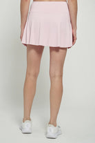 Lija Elite Patina Women's Tennis Skort featuring lightweight stretch performance fabric, built-in shorts, moisture-wicking comfort, and athletic styling.