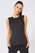 Lija Women's Elite Power Tennis Tank featuring lightweight performance fabric, moisture-wicking comfort, athletic fit, and breathable design.