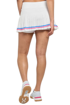 Lija Women's Nevo Status 13 Inch Tennis Skort featuring lightweight stretch performance fabric, built-in shorts, breathable comfort, and athletic styling.