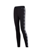 A pair of black Newland Women's Croix de Couer Leggings that feature a white snowflake pattern down the legs and are moisture-wicking, breathable, and stretchable.
