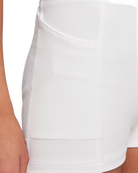 Nike Girls' Dri-FIT Club Golf Skirt featuring moisture-wicking technology, built-in shorts, and lightweight performance comfort.