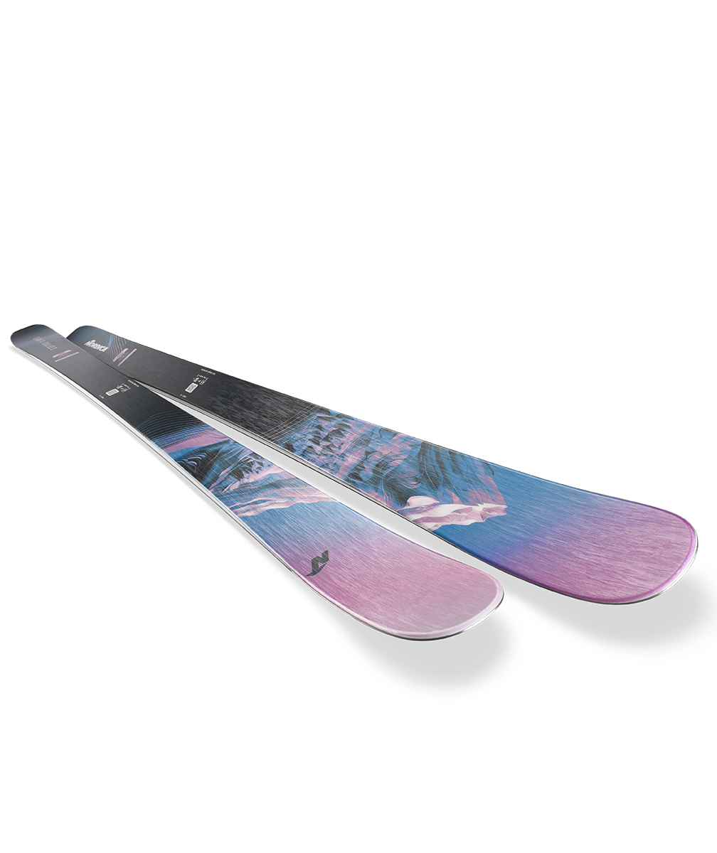 Nordica Santa Ana 80 S Junior Skis with 7.0 bindings in Midnight Blue and Purple, featuring all-mountain rocker and a lightweight wood core.
