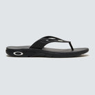 A black Oakley Ellipse Flip flip-flop sandal on a white background