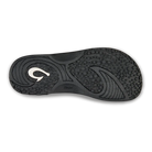 Black Olukai Men's Nalu Slide sandal with a strap on a white background
