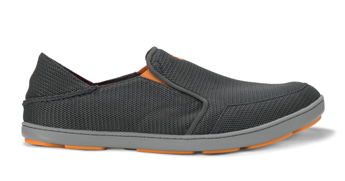 Grey Olukai Men's Nohea Mesh slip-on shoe with orange accents on a white background