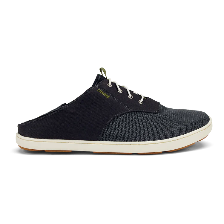 A black Olukai Men's Nohea Moku shoe on a white background