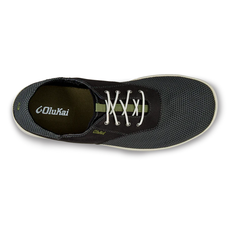 A black Olukai Men's Nohea Moku shoe on a white background