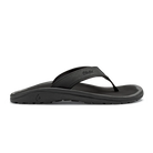 Black Olukai Men's Ohana flip-flop sandal with an Olukai logo on a white background
