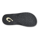 Black Olukai Men's Ohana flip-flop sandal with an Olukai logo on a white background