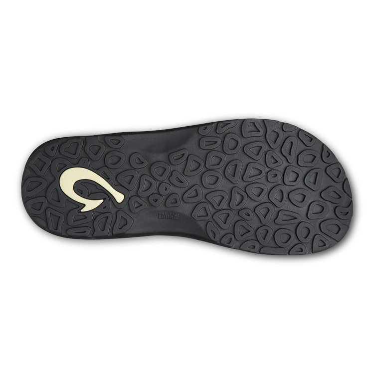 Black Olukai Men's Ohana flip-flop sandal with an Olukai logo on a white background