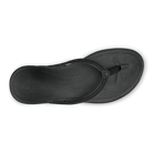 A black Olukai Women's Ho'opio flip-flop sandal on a white background