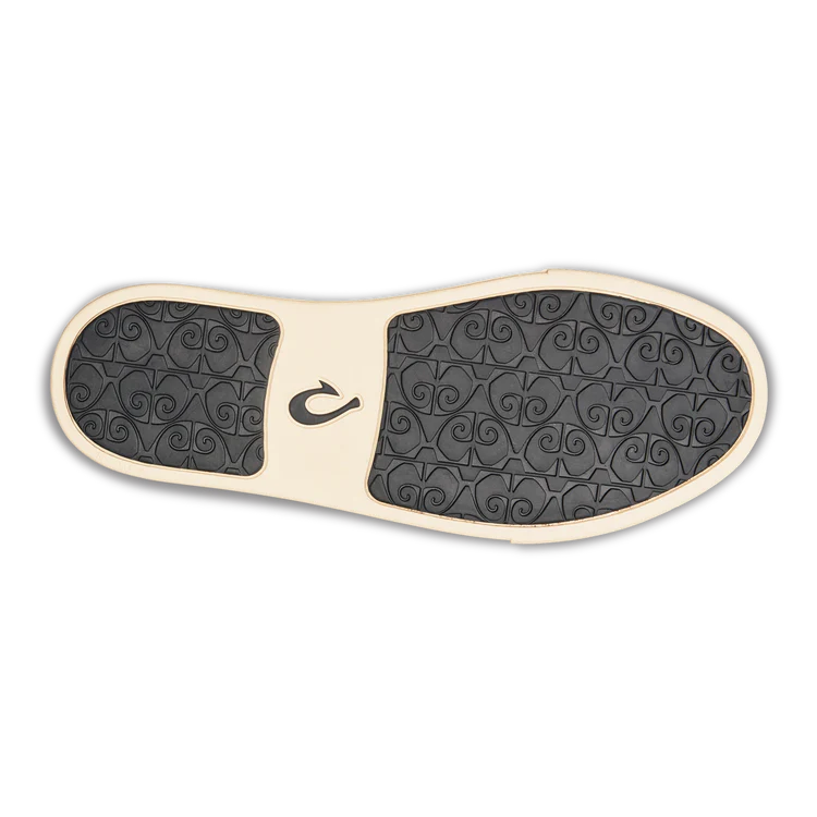 Black Olukai Women's Pehuea slip-on shoe that features a collapsible heel with a white sole on a white background