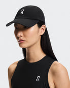On Court Cap featuring lightweight construction, breathable performance fabric, adjustable fit, and a curved brim for sun protection.