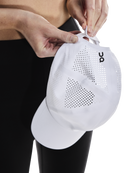 On Court Cap featuring lightweight construction, breathable performance fabric, adjustable fit, and a curved brim for sun protection.