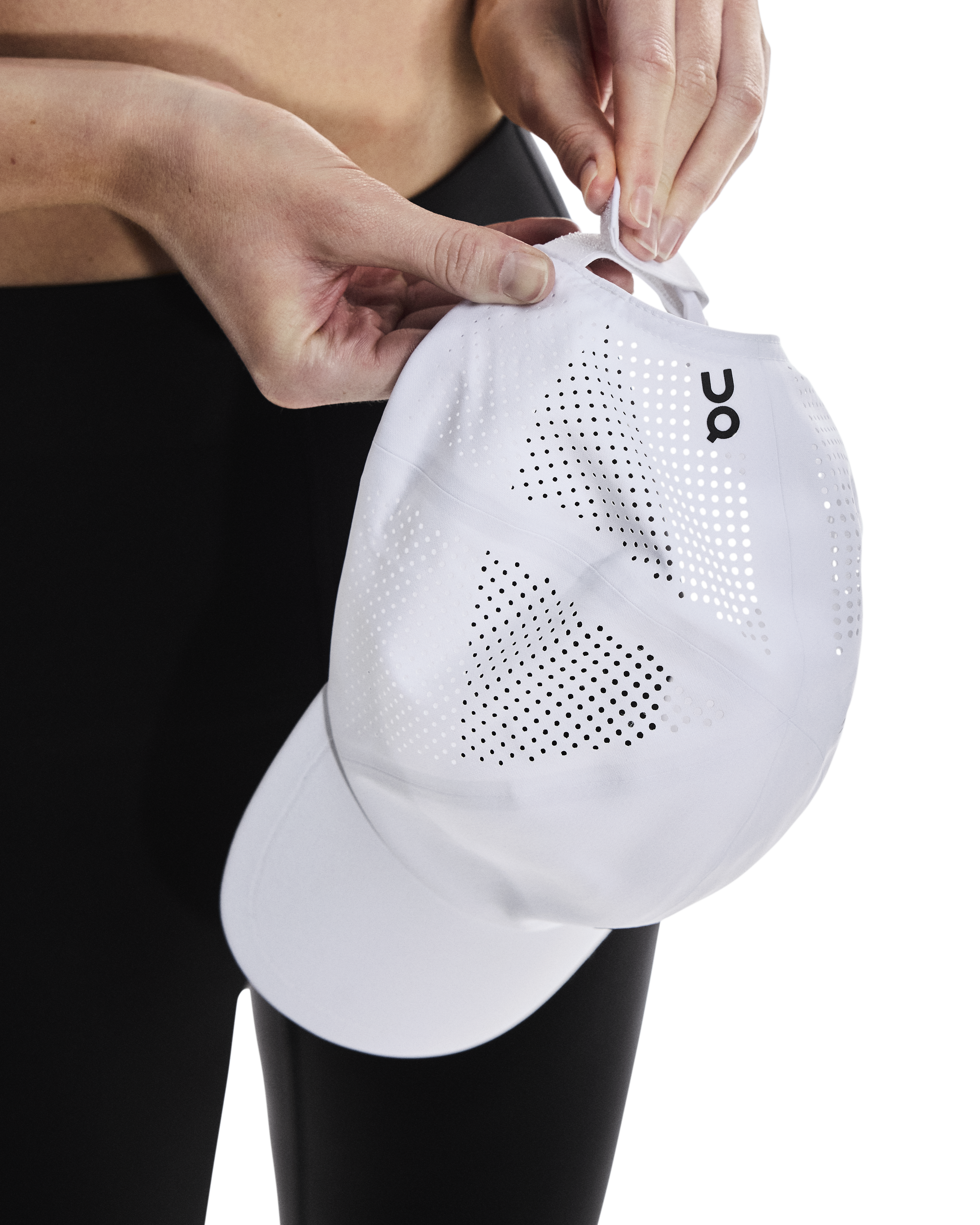On Court Cap featuring lightweight construction, breathable performance fabric, adjustable fit, and a curved brim for sun protection.